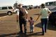 Seth was holding Mary's hand on the pier and asked to hold Grandpa Charlie's hand too.
