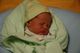 I couldn't resist these colors.
Seth was swaddled and propped up in the boppy (who ever named that product, anyway?  Must've been a Brit).
King Seth.
Day 6.