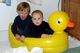 In baby Zachary's ducky tub on Christmas Eve at Papa's house.