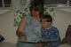 Grandma and Jerome reading "God's Wisdom for Little Boys" for bedtime stories.