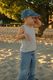 Seth was throwing sand and it got in his eye. However the discomfort didn't stop him from doing it again!